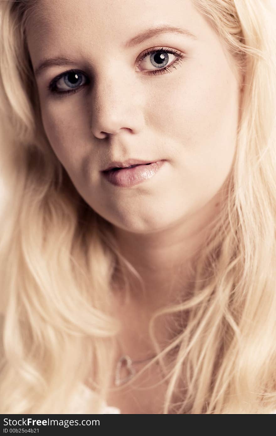 A model portrait on a white background. A model portrait on a white background