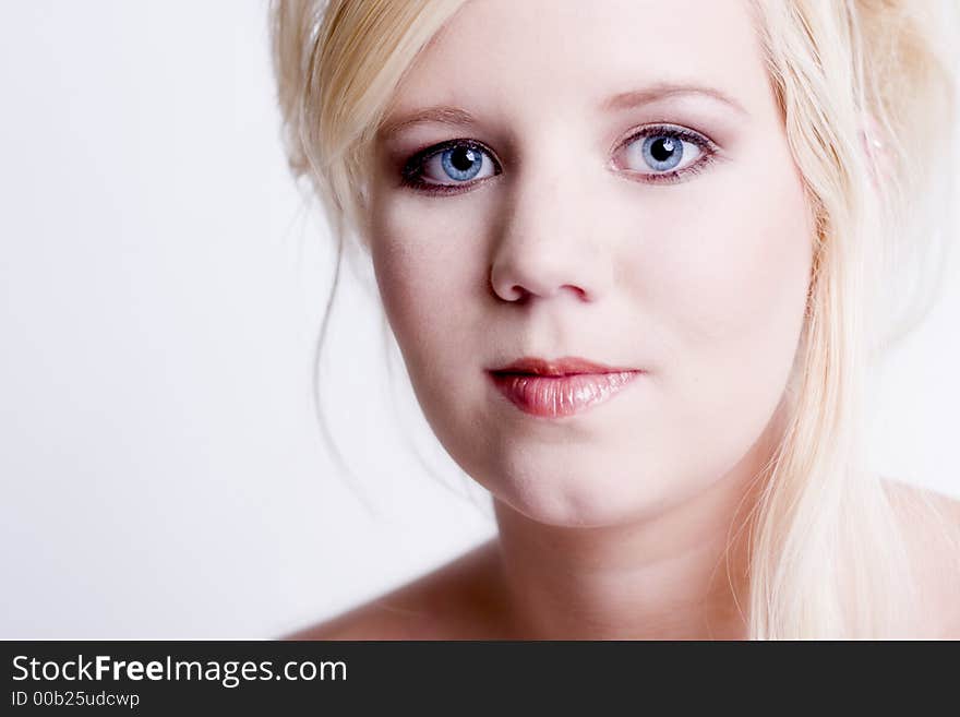 A model portrait on a white background. A model portrait on a white background