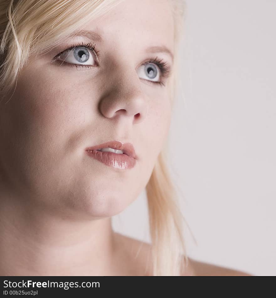 A model portrait on a white background. A model portrait on a white background