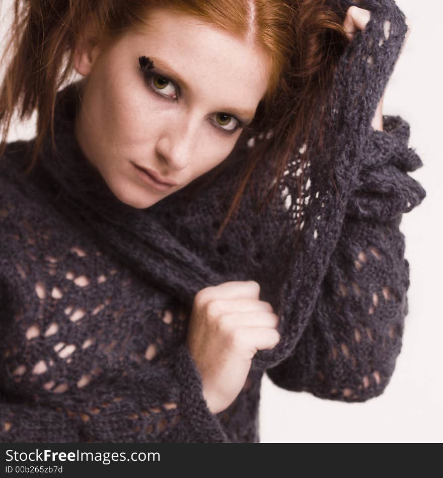 A model posing in the photo studio. A model posing in the photo studio