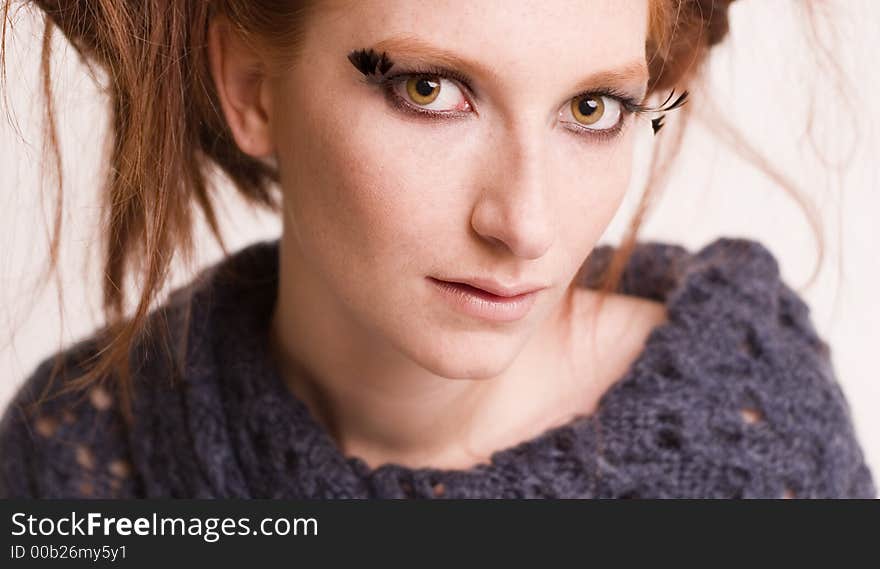 A model posing in the photo studio. A model posing in the photo studio