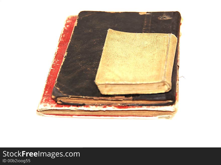 Three very old books in nice composition.