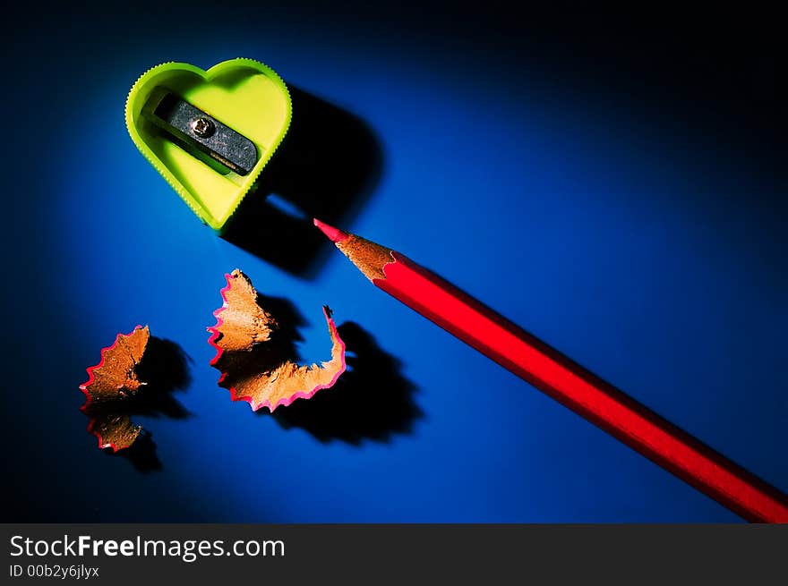 Sharpener for pencils in the form of heart