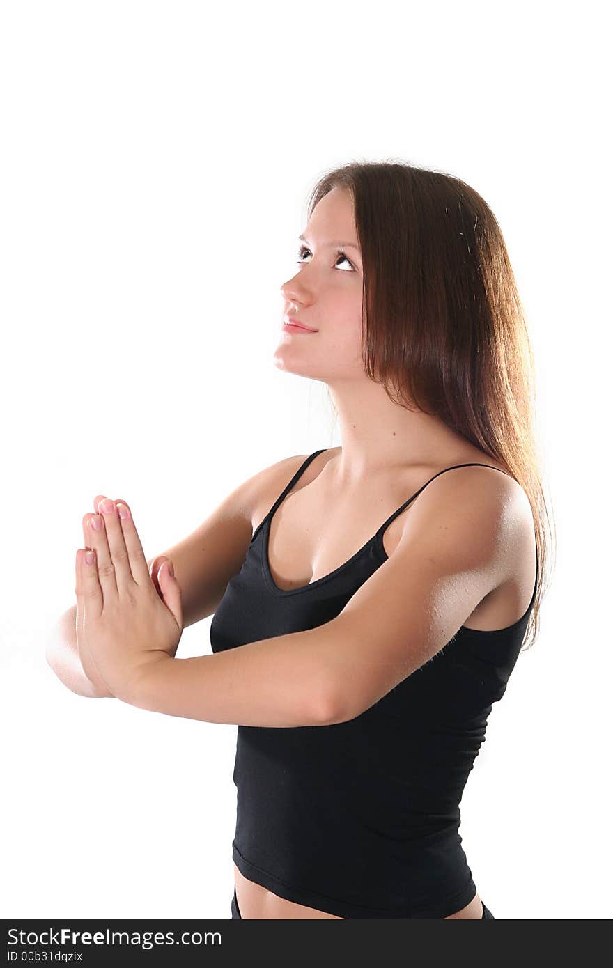 The sports girl meditates after training. The sports girl meditates after training