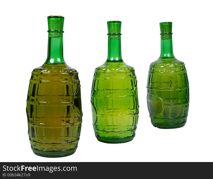 Three bottles of white wine, isolated on white