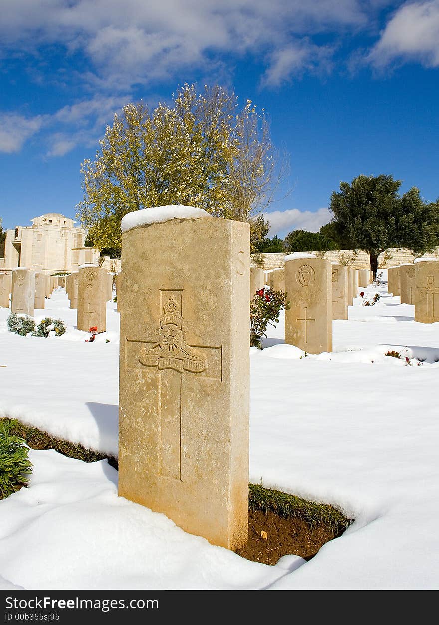 Military Cemetery covered with snow on a clear day. Military Cemetery covered with snow on a clear day