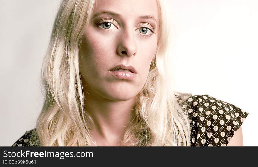 A model posing in the photo studio. A model posing in the photo studio