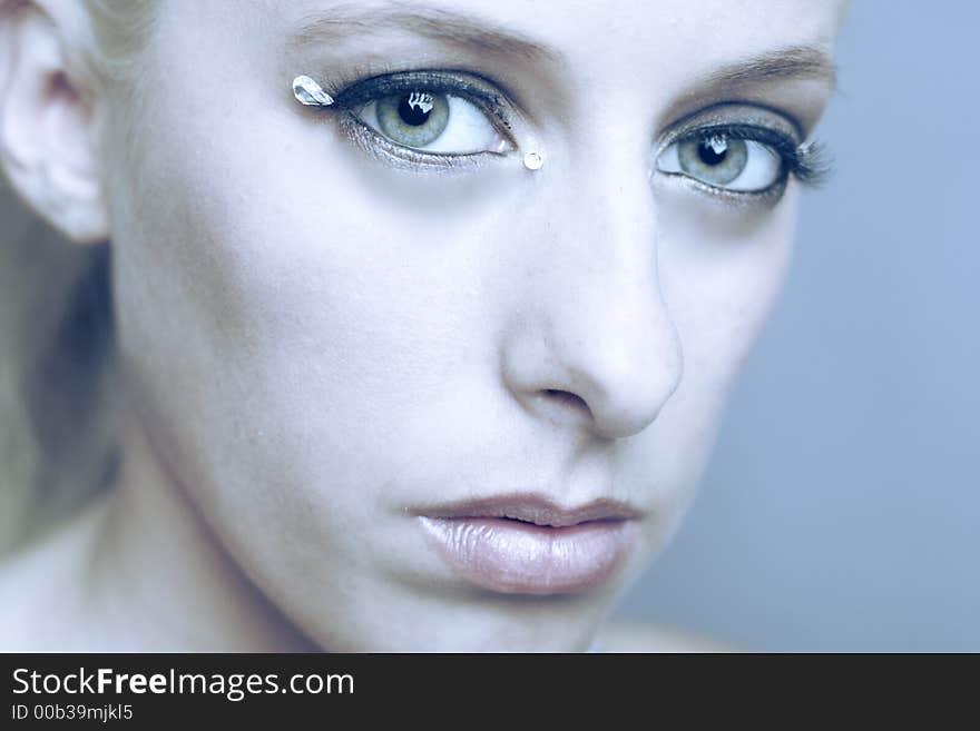 A model posing in the photo studio. A model posing in the photo studio