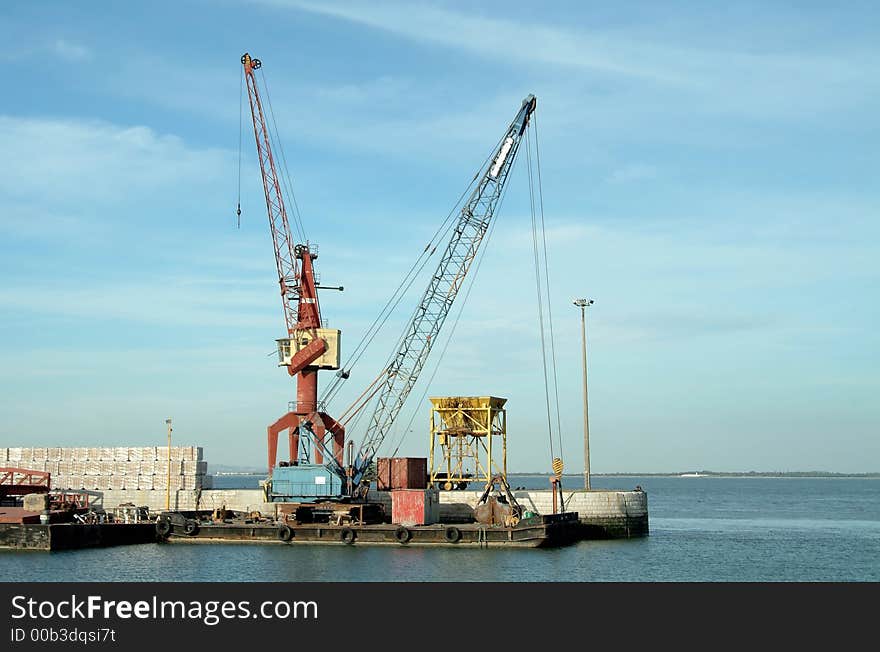 General sight of port with boats and cranes. General sight of port with boats and cranes