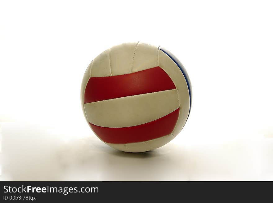 A beach volley ball isolated against a white background. A beach volley ball isolated against a white background