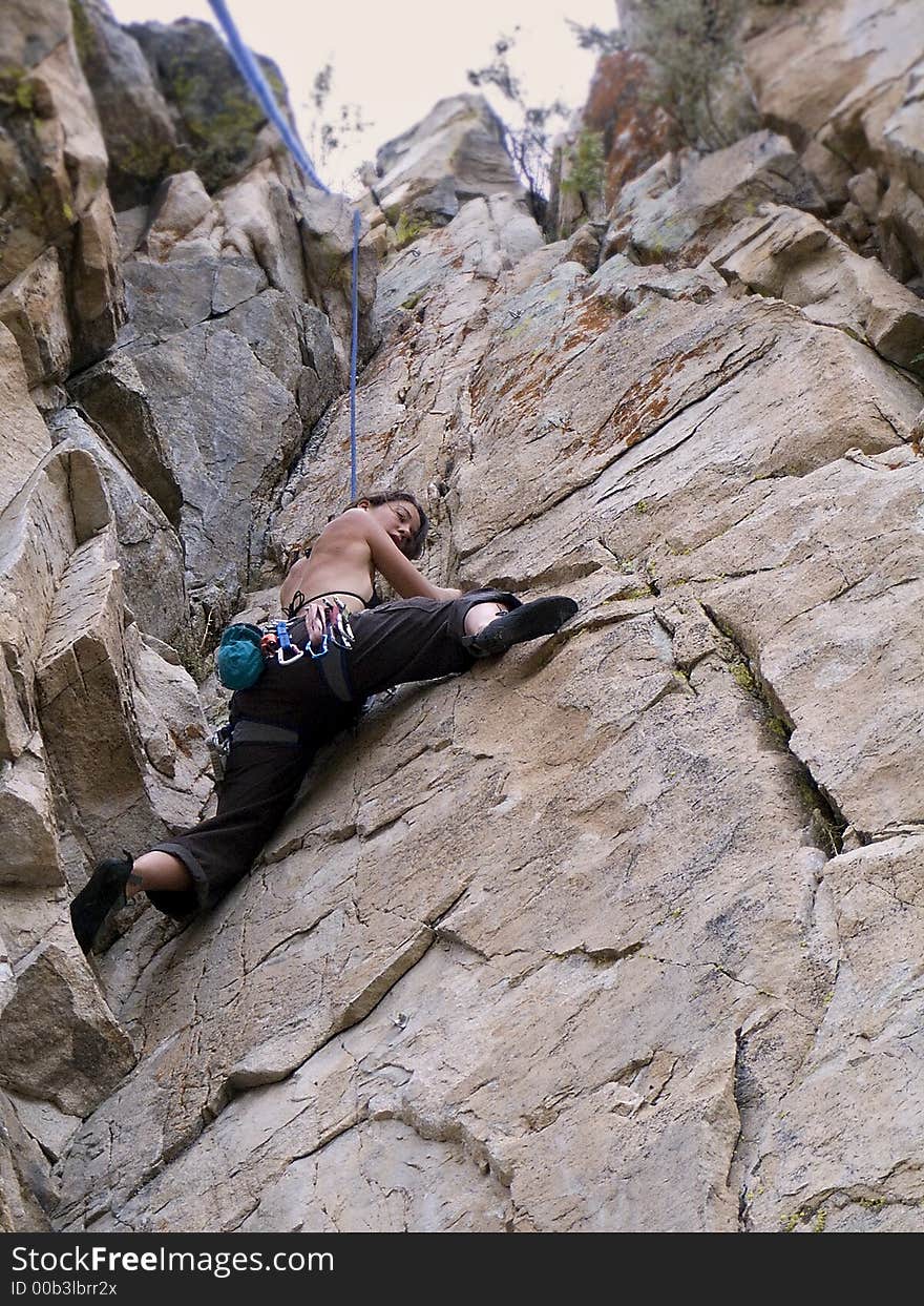 Female rock climber in Eastern Sierra Nevada mountains near Yosemite National Park, California. Female rock climber in Eastern Sierra Nevada mountains near Yosemite National Park, California.