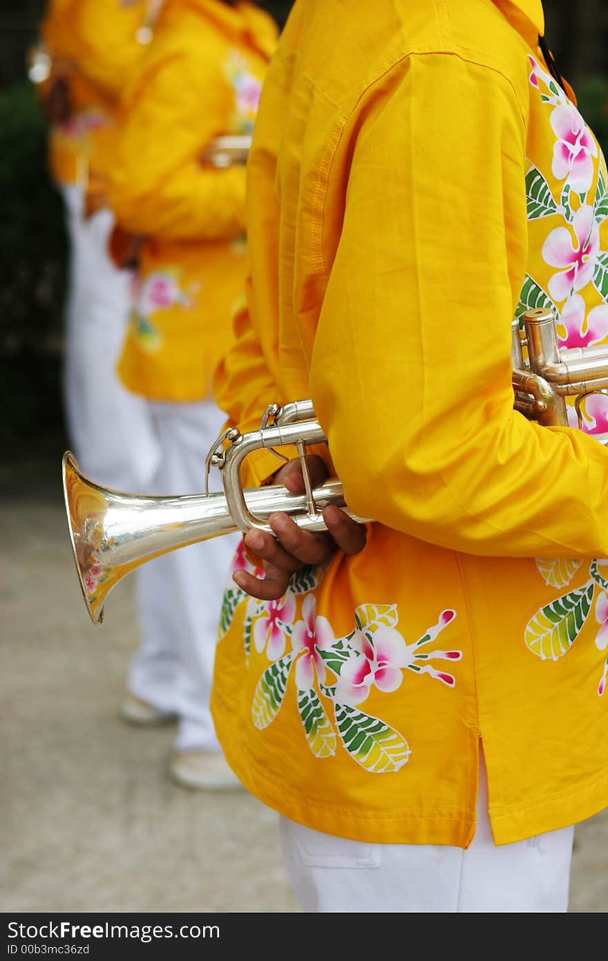 Band member holding a trumpet