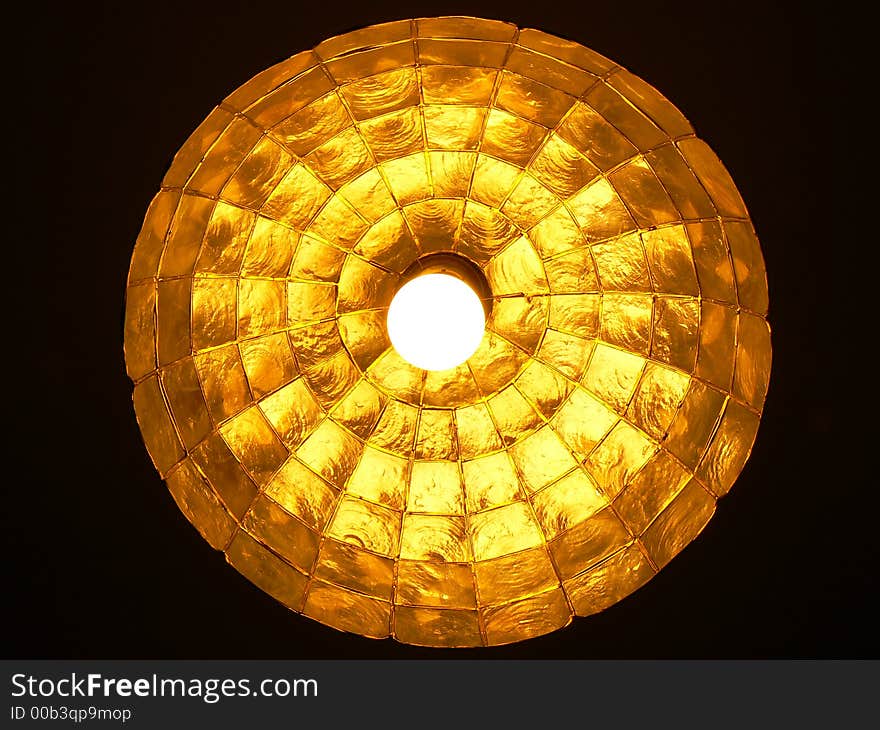 Bottom of the lamp looking like gold ball.