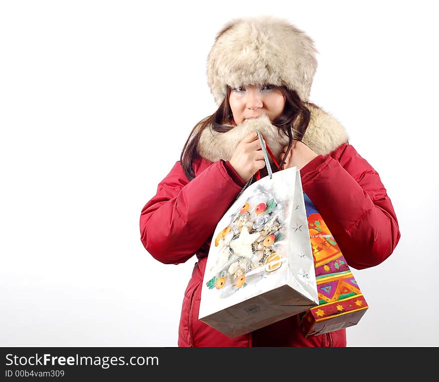 Attractive woman with shopping bags on white background. Attractive woman with shopping bags on white background