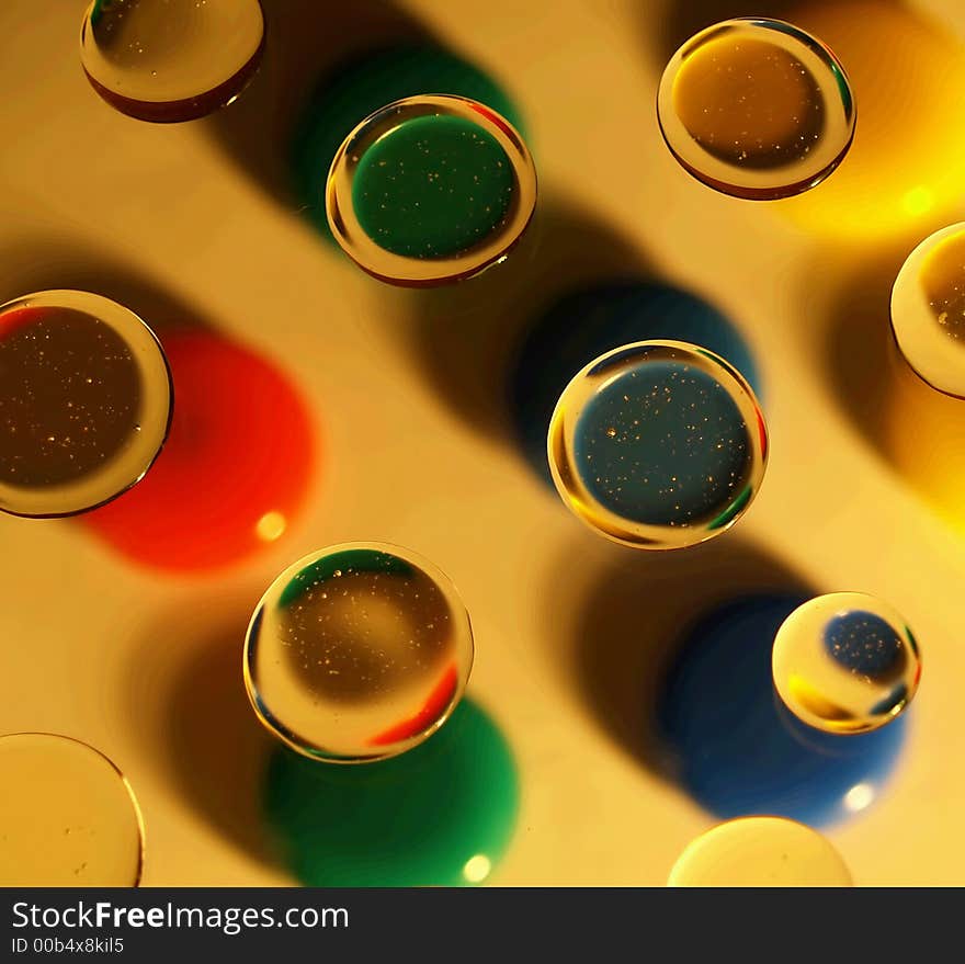 Blobs of multiple colors seen through bubbles. Blobs of multiple colors seen through bubbles.