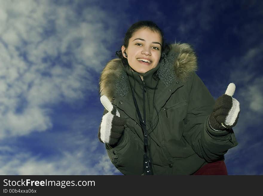 Young, beautiful and happy girl with mp3 player. Young, beautiful and happy girl with mp3 player