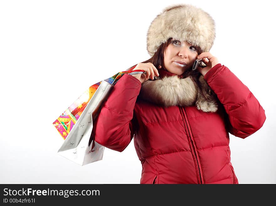 Attractive woman with shoppin bags on white background. Attractive woman with shoppin bags on white background