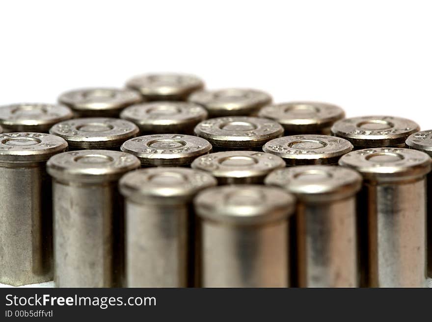 Cartridge for a handgun and a white background