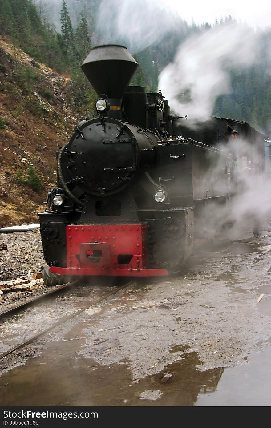 Old steam locomotive driving in speed. Old steam locomotive driving in speed