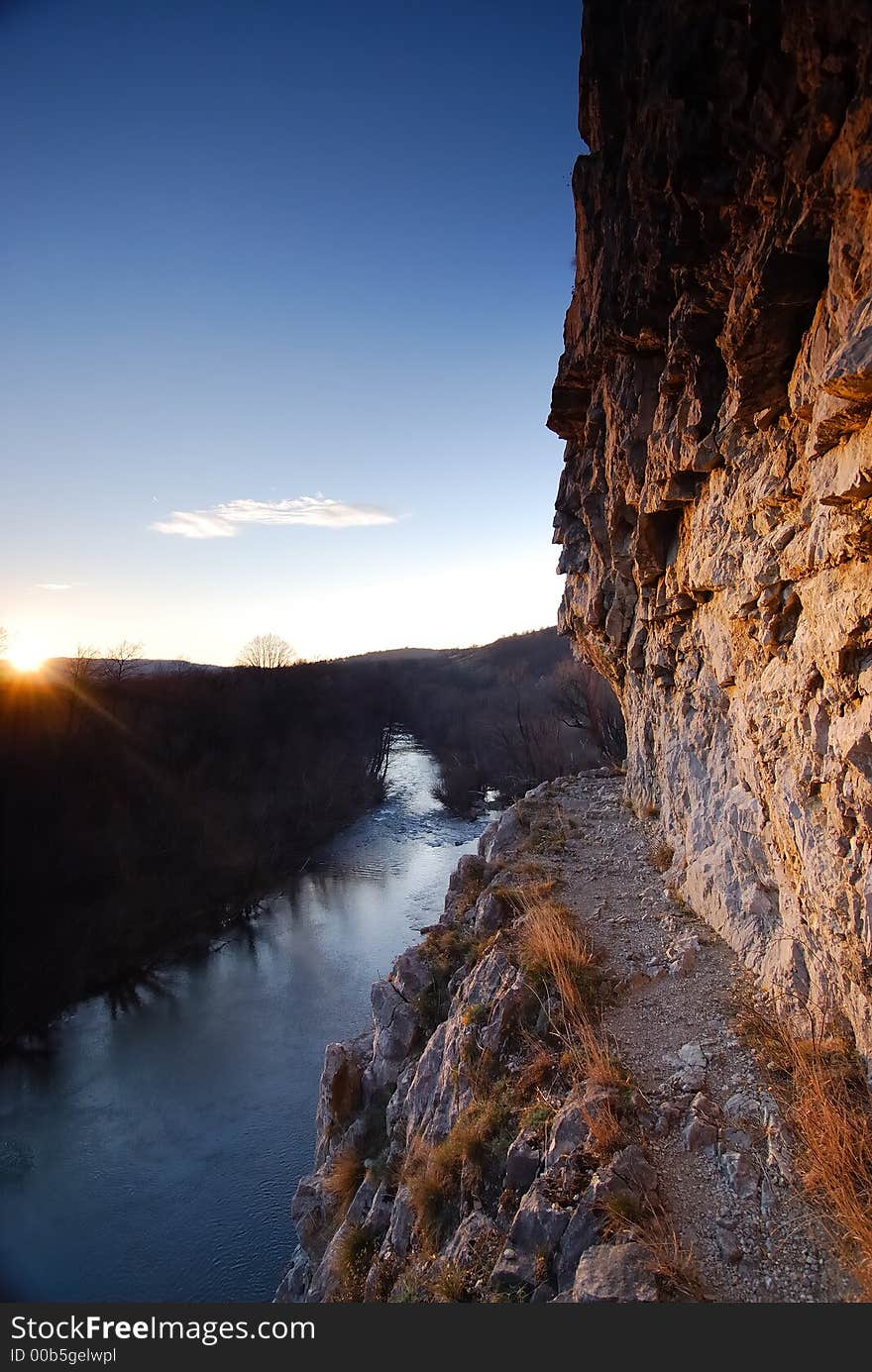 Mountain and river at sunset