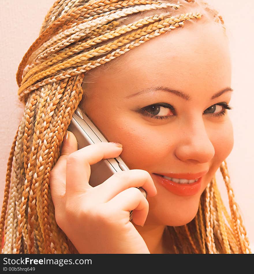 Young beautiful blond hair woman with braids. Young beautiful blond hair woman with braids