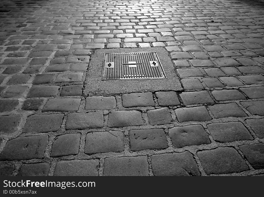 Wet old pathway with light reflection