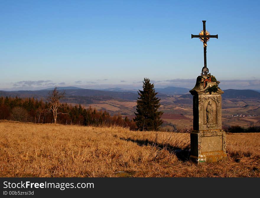 Memorial with crucifix on Giant mountains in the Czech Republic. Memorial with crucifix on Giant mountains in the Czech Republic