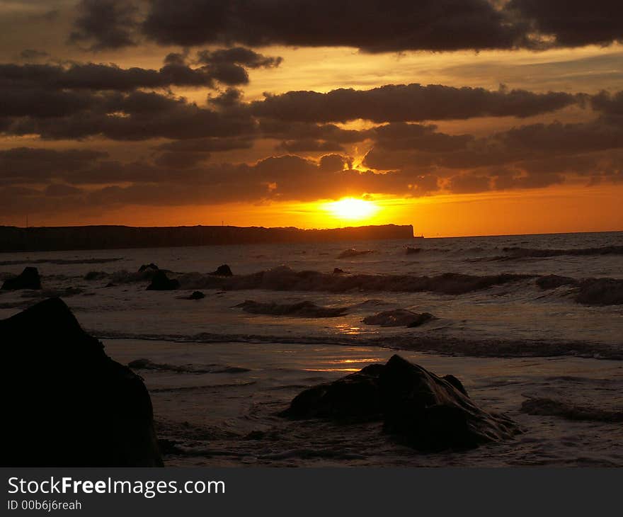 Sunset on the beach of sotteville. Sunset on the beach of sotteville