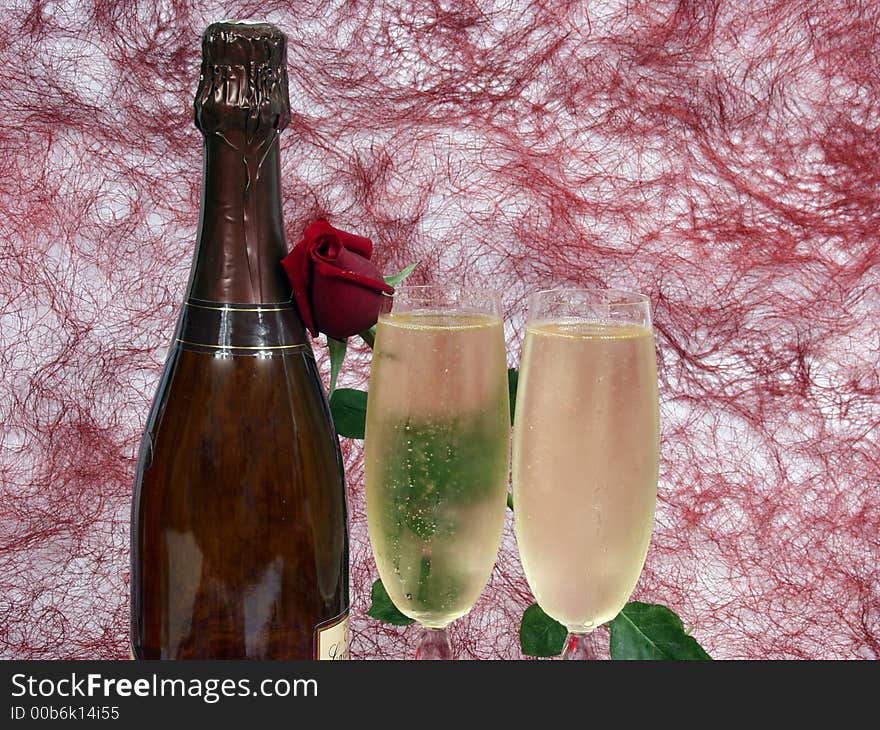 Champagne bottle and two cups for celebrate san valentine`s day