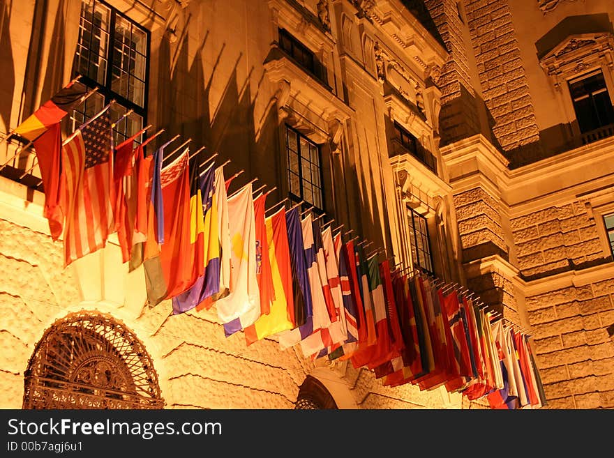 Castle part with many flags