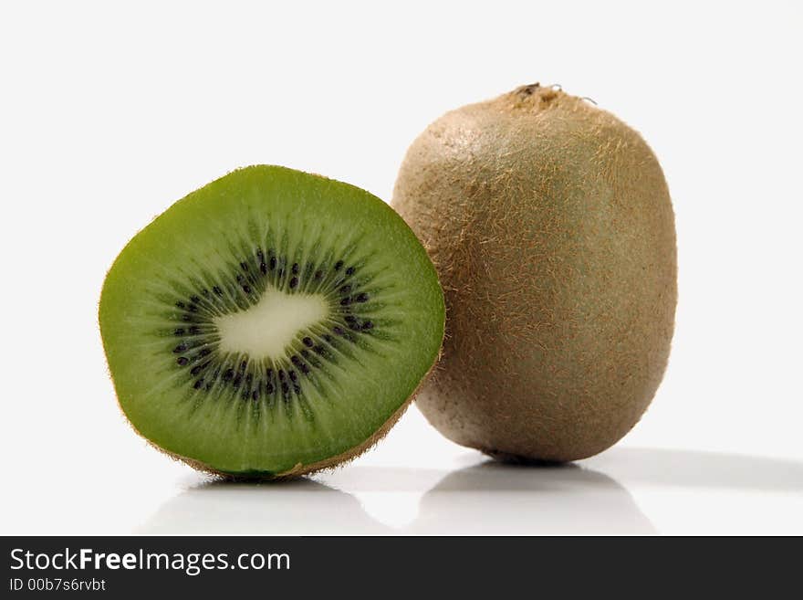 Close-up of kiwis over white background