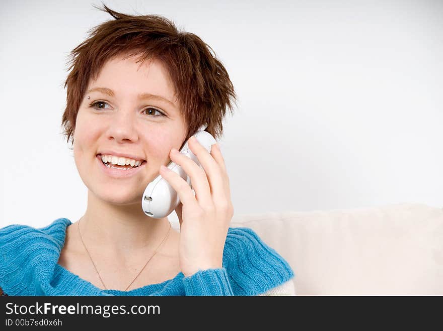 Lovely woman smiling which chatting on the phone. Lovely woman smiling which chatting on the phone