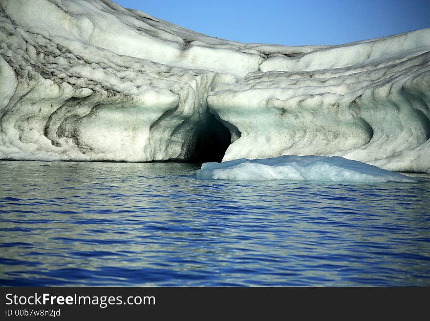 Iceberg with layers of lava through it Jokulsarlon lagoon Iceland. Iceberg with layers of lava through it Jokulsarlon lagoon Iceland