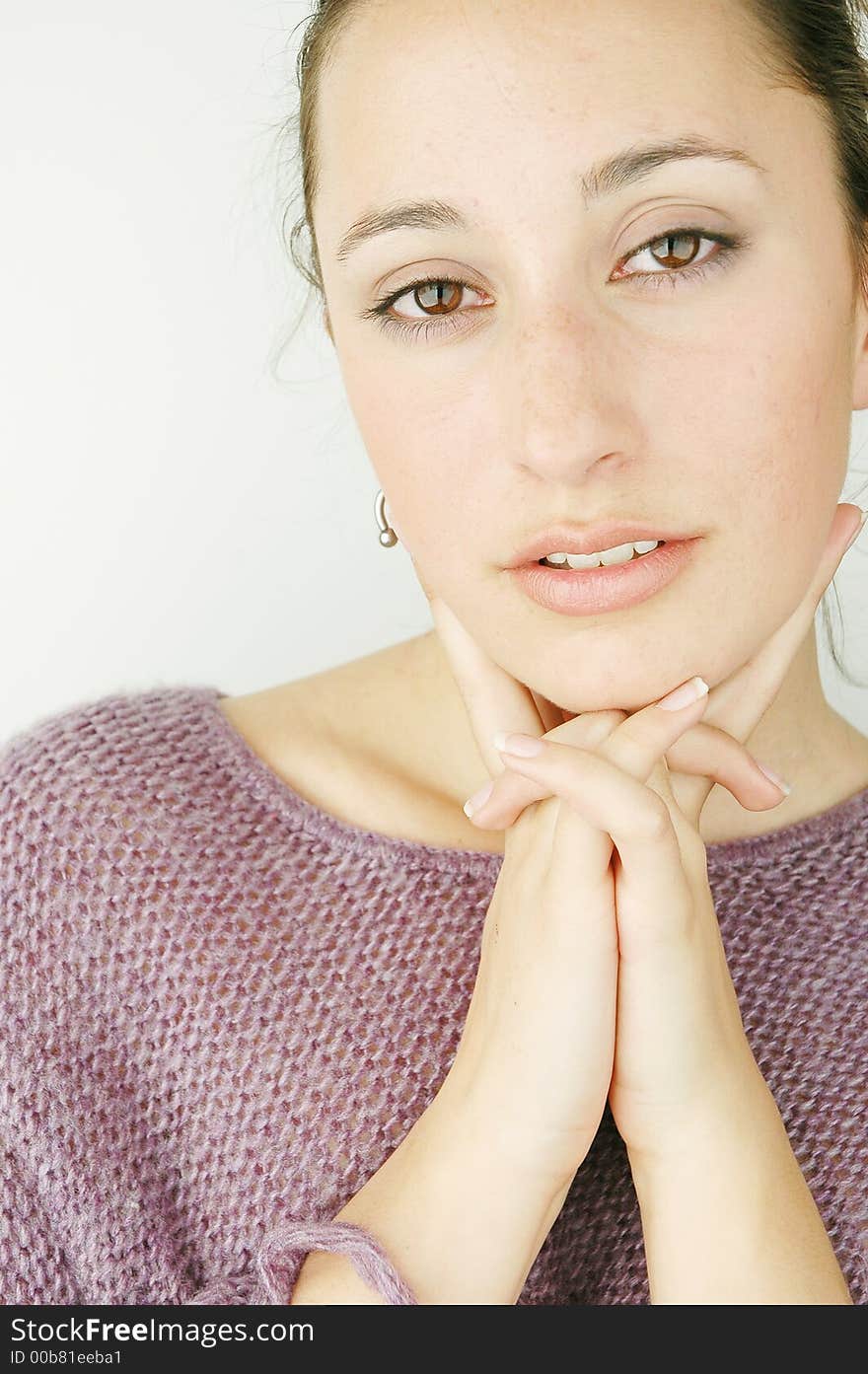 Beautiful girl portrait deeply in thinking against white background. Beautiful girl portrait deeply in thinking against white background