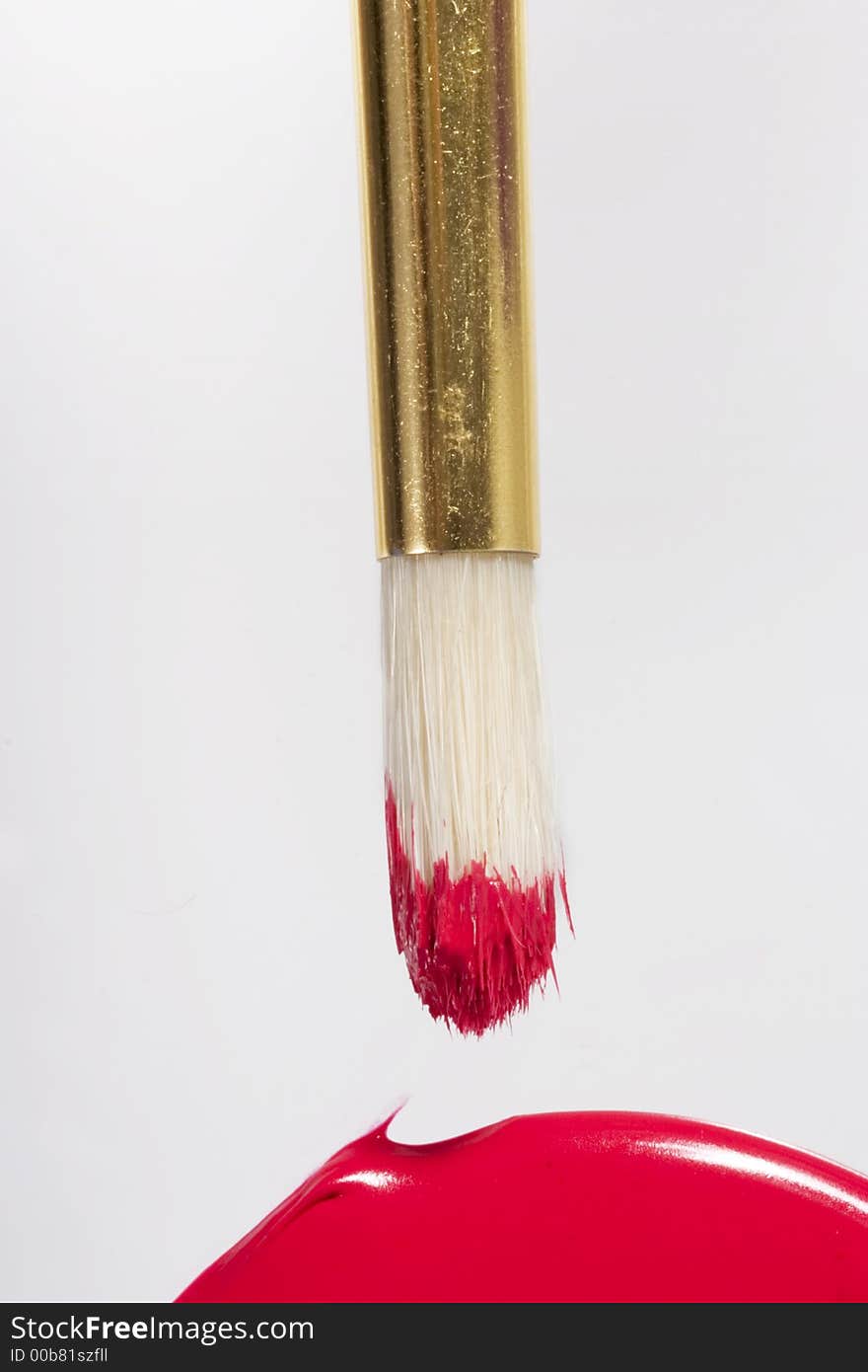 Paint brush close up with red color. Paint brush close up with red color