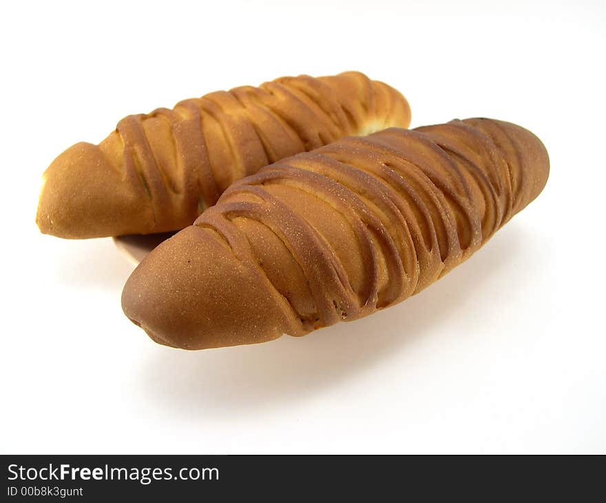 Beautiful bread on a plate on a white background