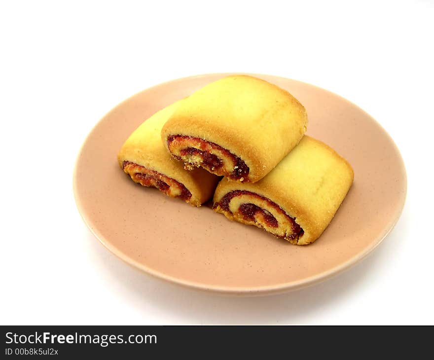 Beautiful cookies on a plate on a white background