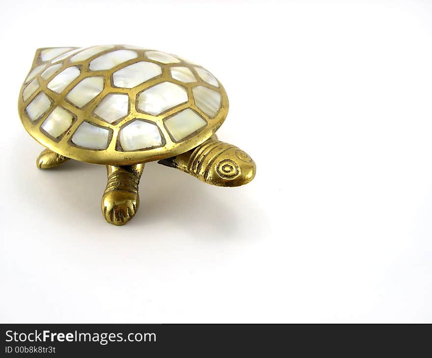 Statue of a turtle on a white background