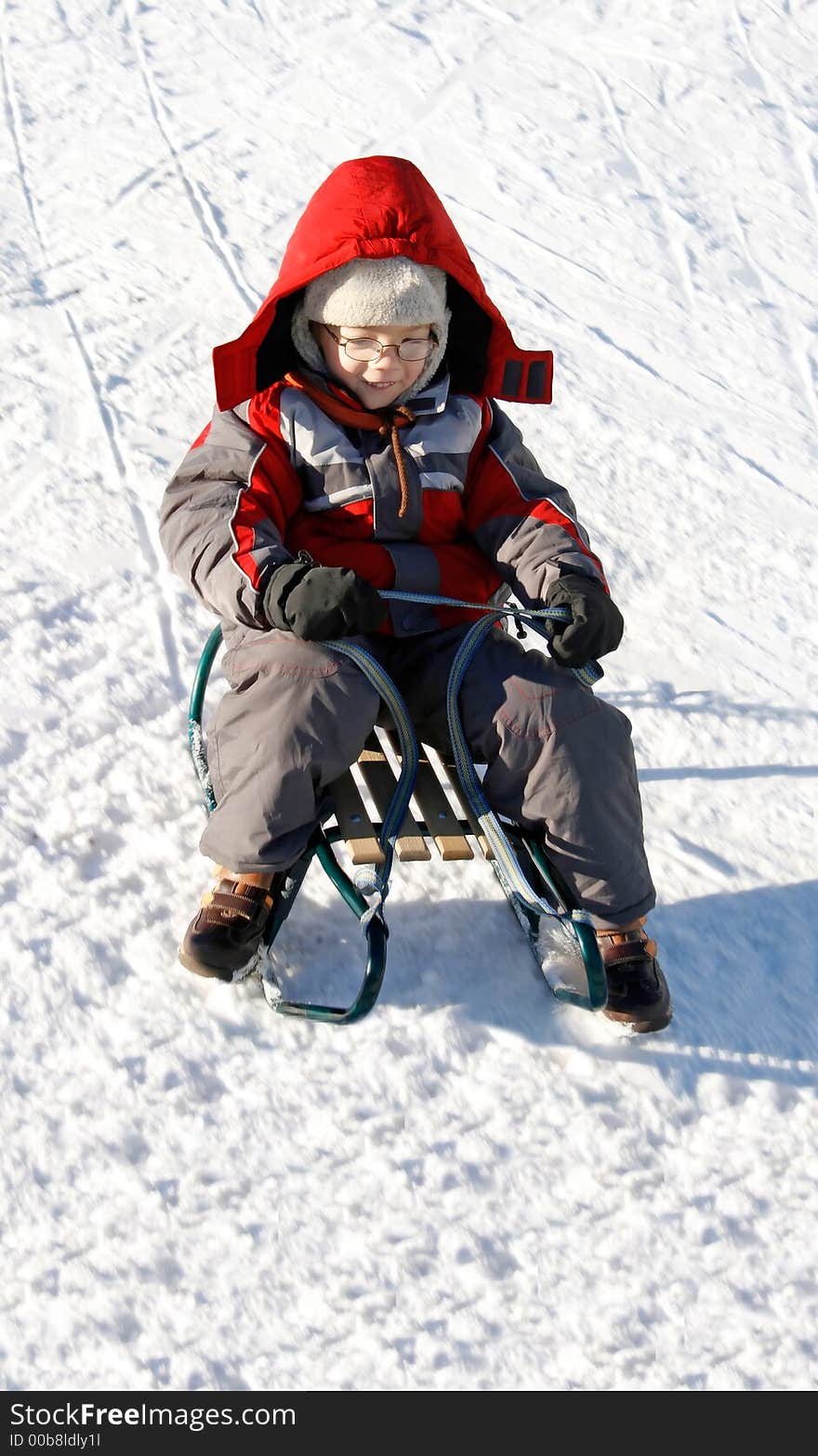 Boy with sled in winter time. Boy with sled in winter time