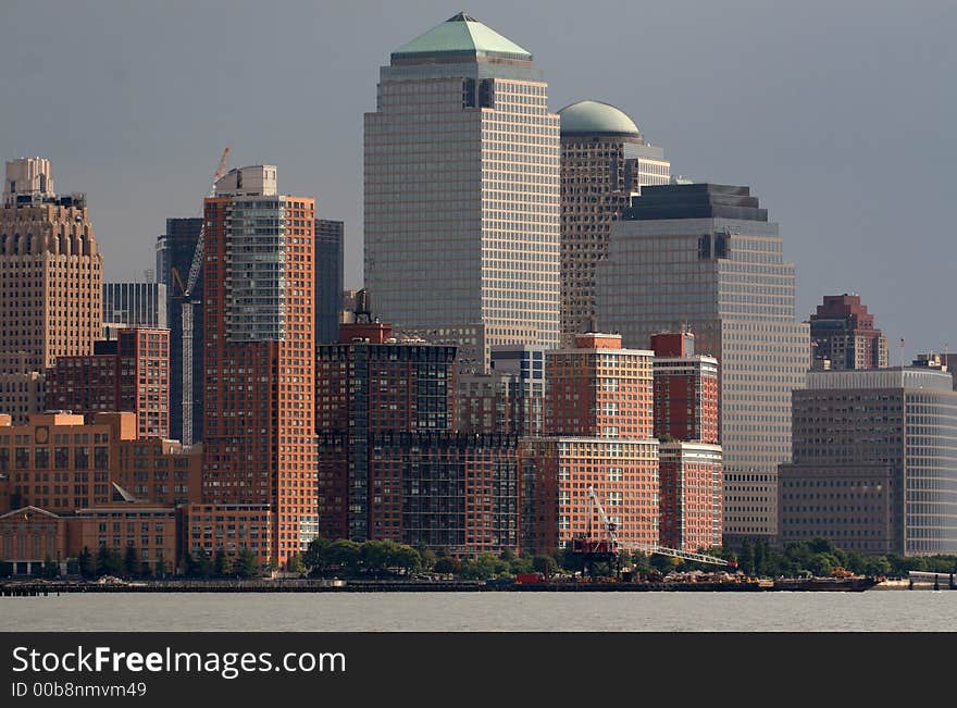 World Financial Center with a crane doing construction at the World Trade Center site. World Financial Center with a crane doing construction at the World Trade Center site.