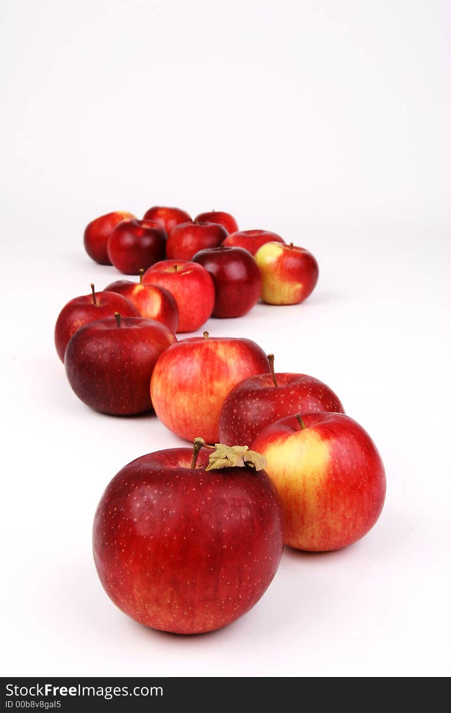 A zig zag line of red apples