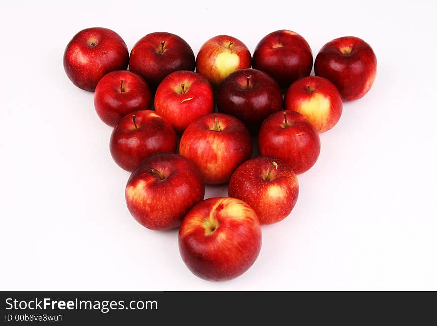 Bunch of apples in the shape of a triangle