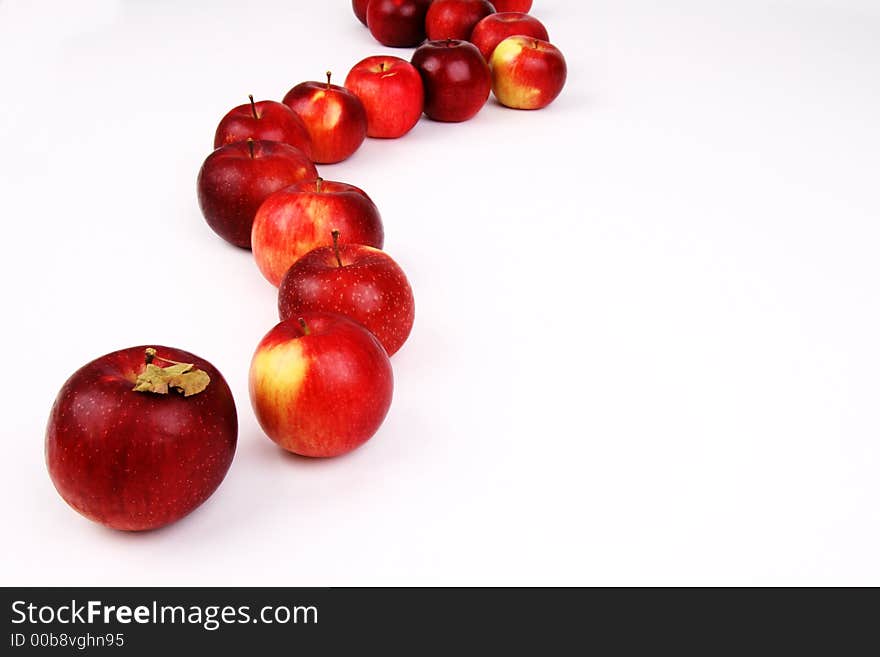 A curved line of apples