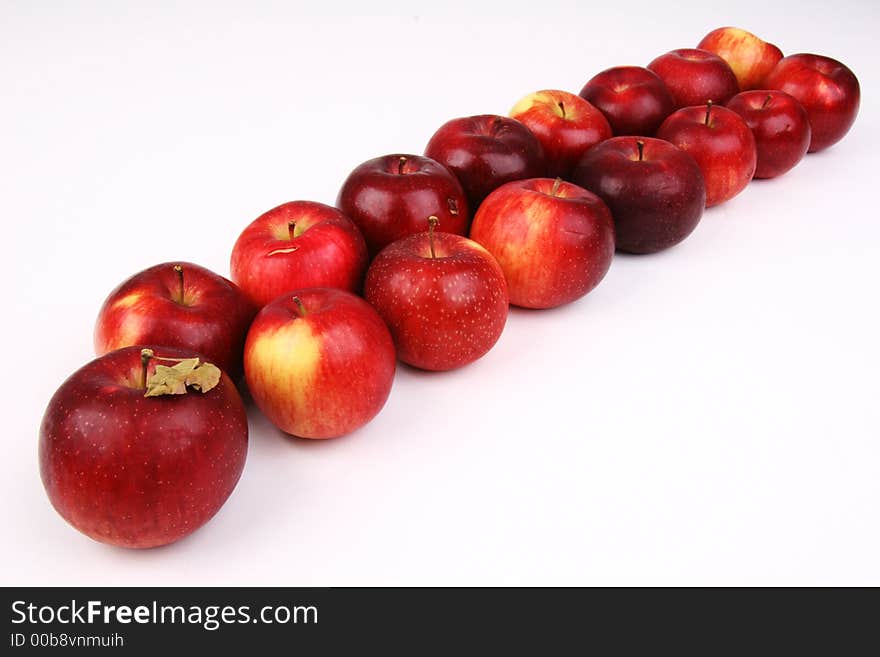 A straight line of apples