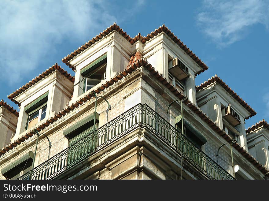 Old architectural corner building against sky in Lisbon