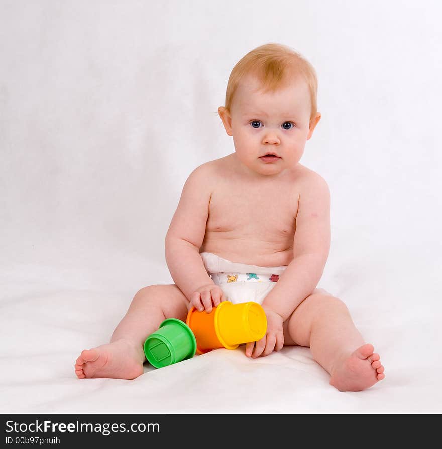 Happy smiling baby 11 month old sitting. Happy smiling baby 11 month old sitting