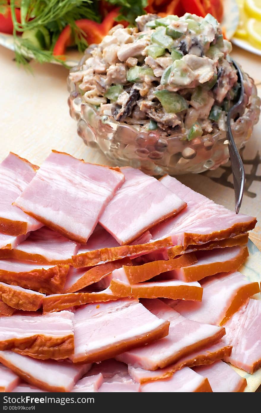 Plate with snack from bacon-laying of a celebratory table