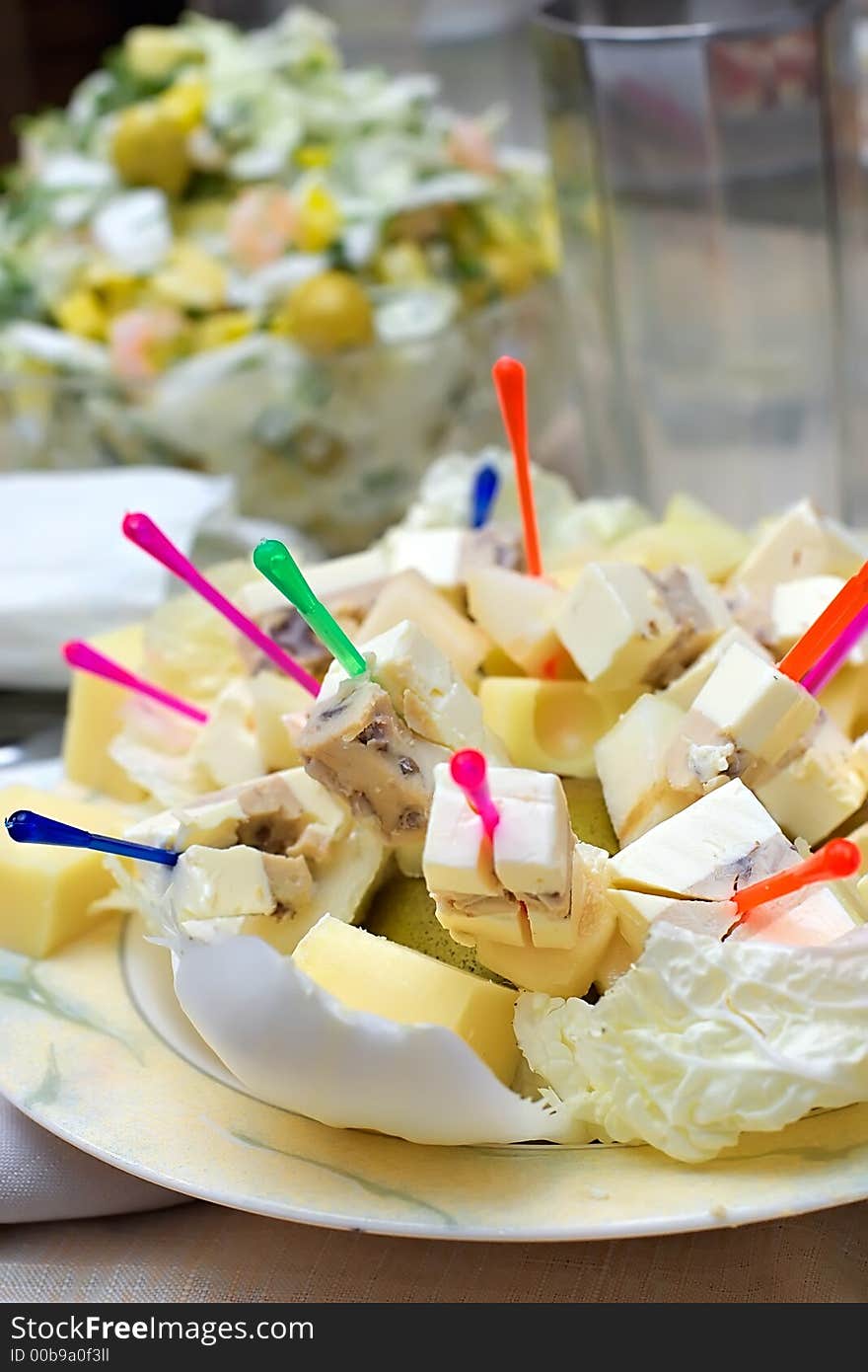 Appetizing snack from different grades of cheese-laying of a celebratory table