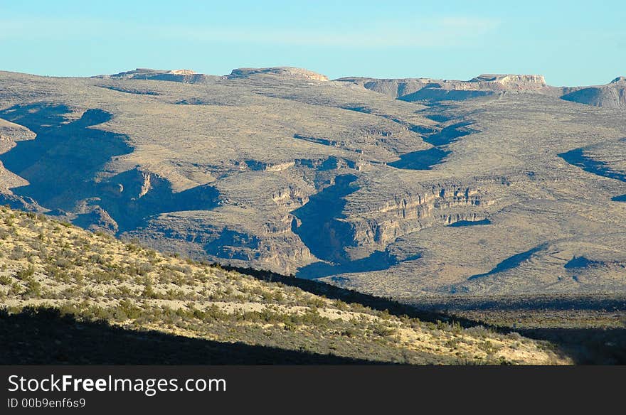 A beautiful view of the desert and mountains. A beautiful view of the desert and mountains.