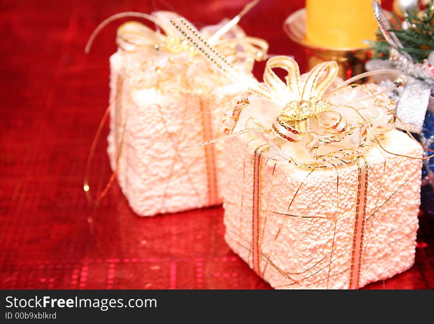 Two Christmas Gifts On A Red Background 1